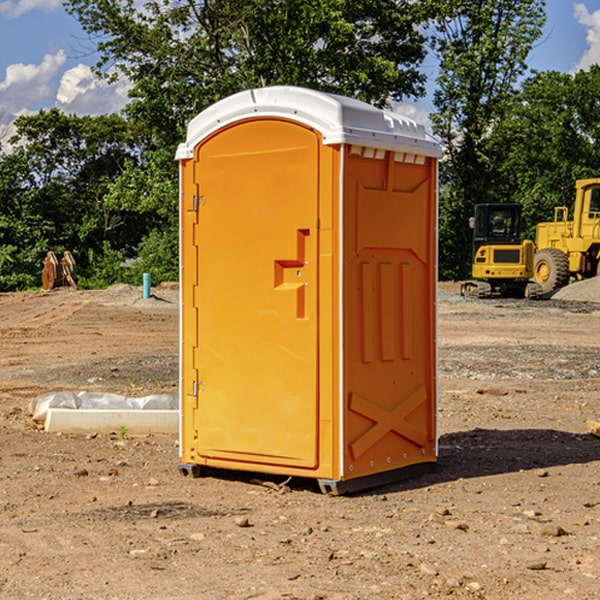 how often are the portable restrooms cleaned and serviced during a rental period in Cubero